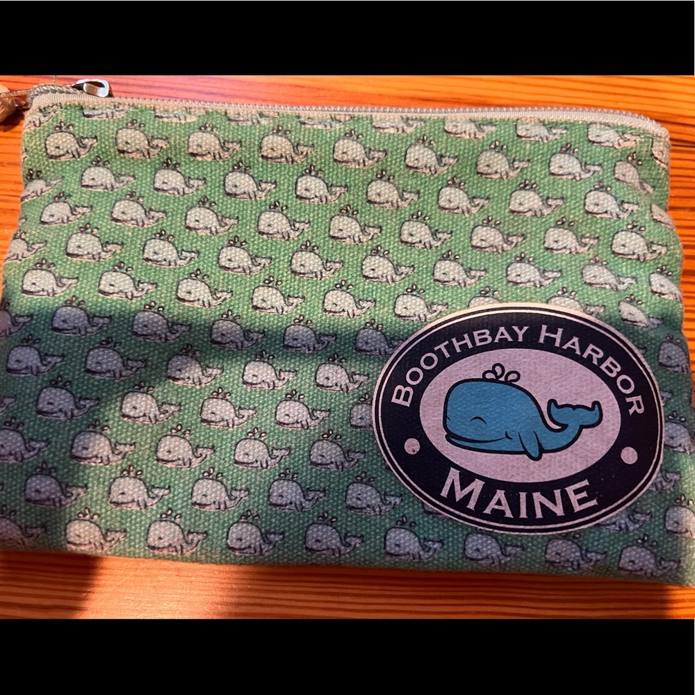 Green whale print wristlet.